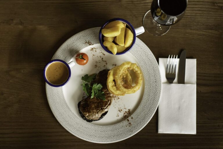 Viking Hotel Waterford 10oz steak with onion rings and chips