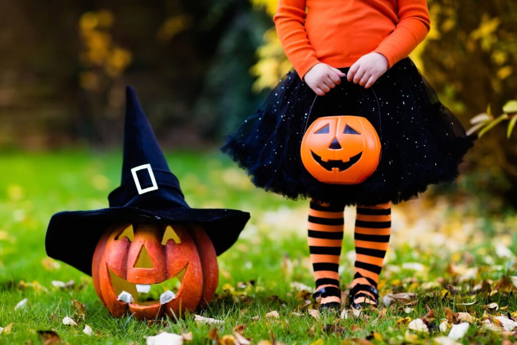 Halloween decorations on a small child