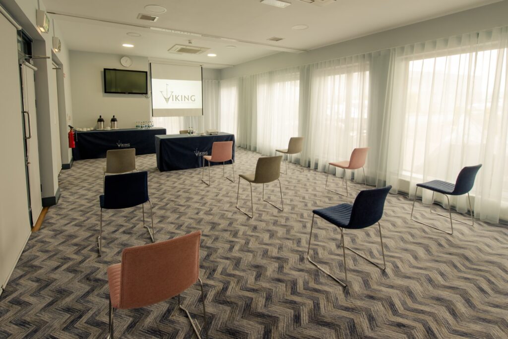 Viking Hotel meeting room socially distanced side angle