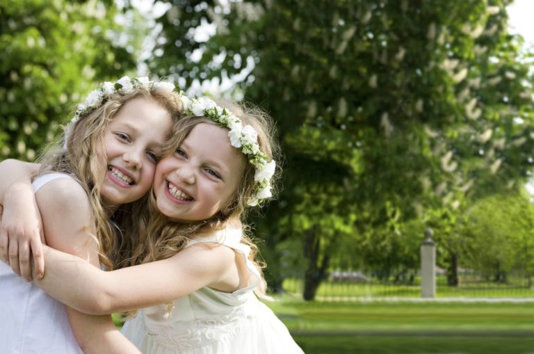 two girl friends on their first holy communion