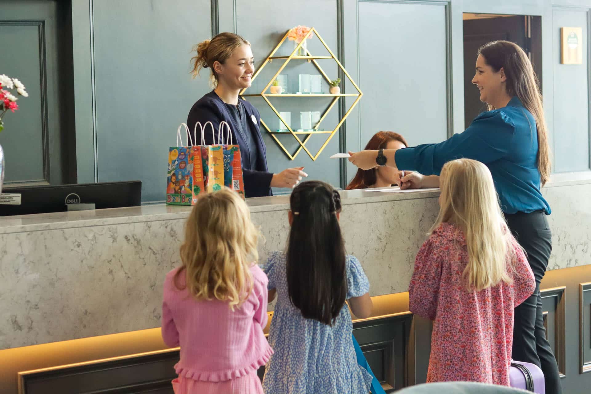 Family checking-in at reception at Viking Hotel Waterford