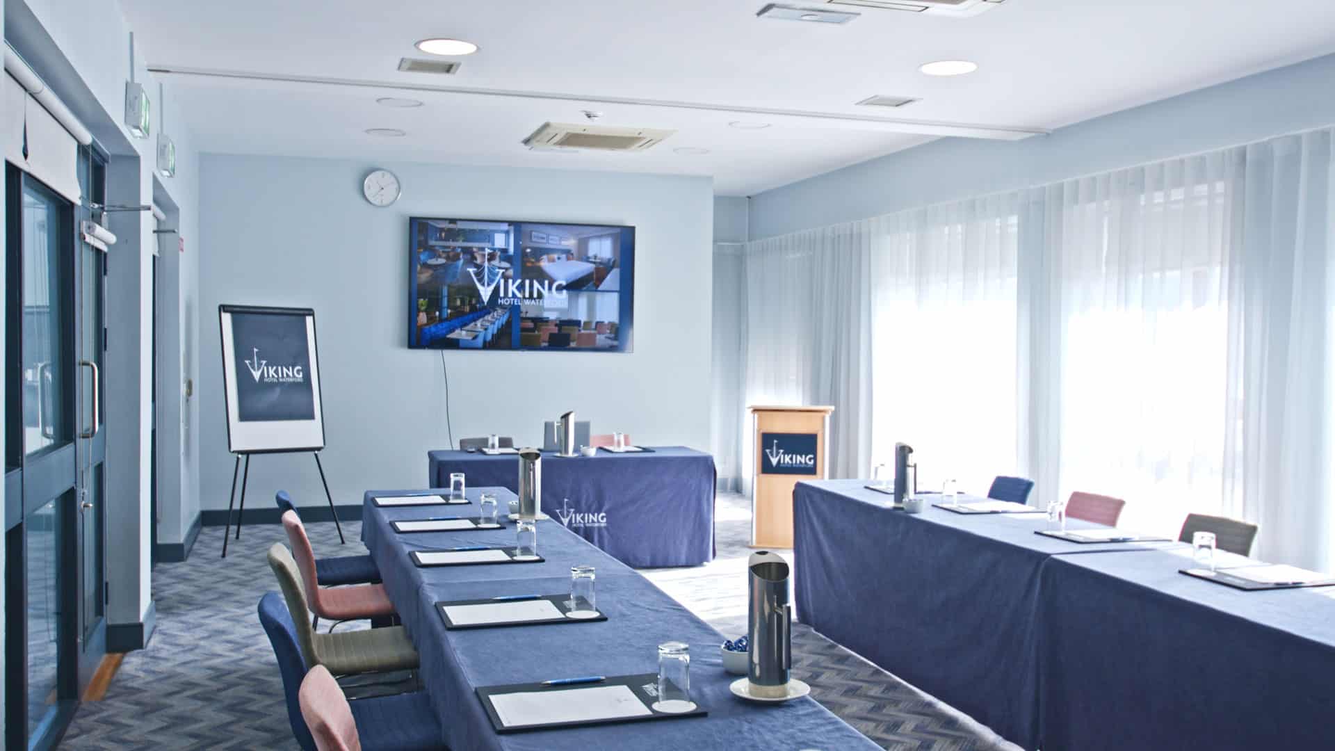Wide view of two tables facing each other at Viking Hotel