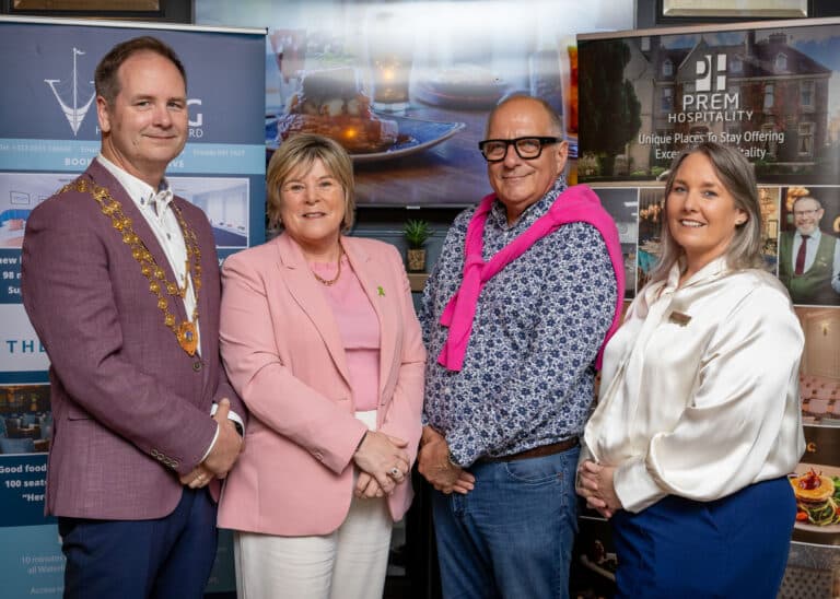 Group photo announcement of new rooms at Viking with Hugh Wallace